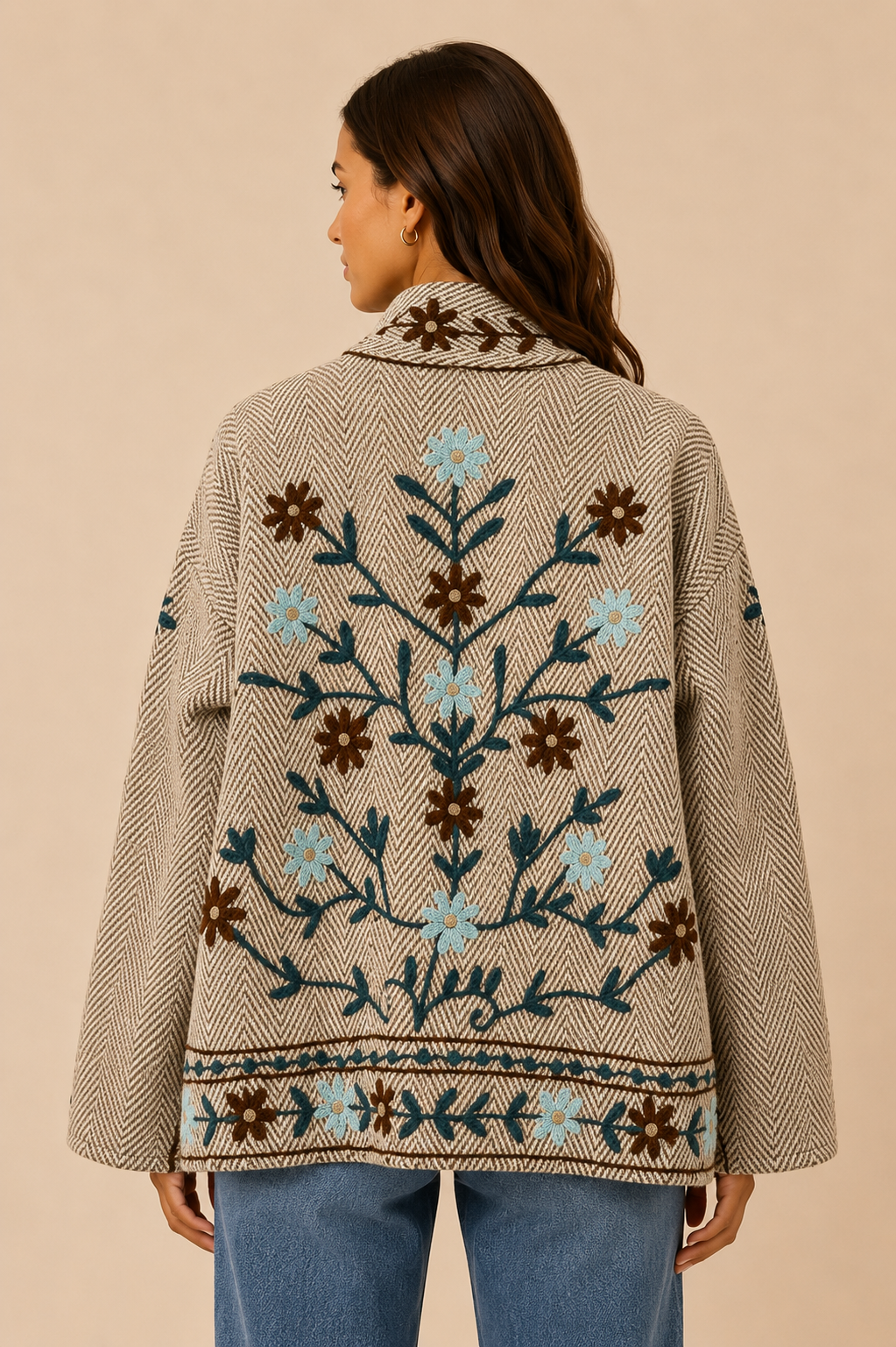 Back view of the Emmy embroidered reversible jacket featuring floral embroidery